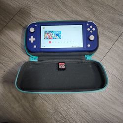 Nintendo Switch Lite W/ Free Game And Case