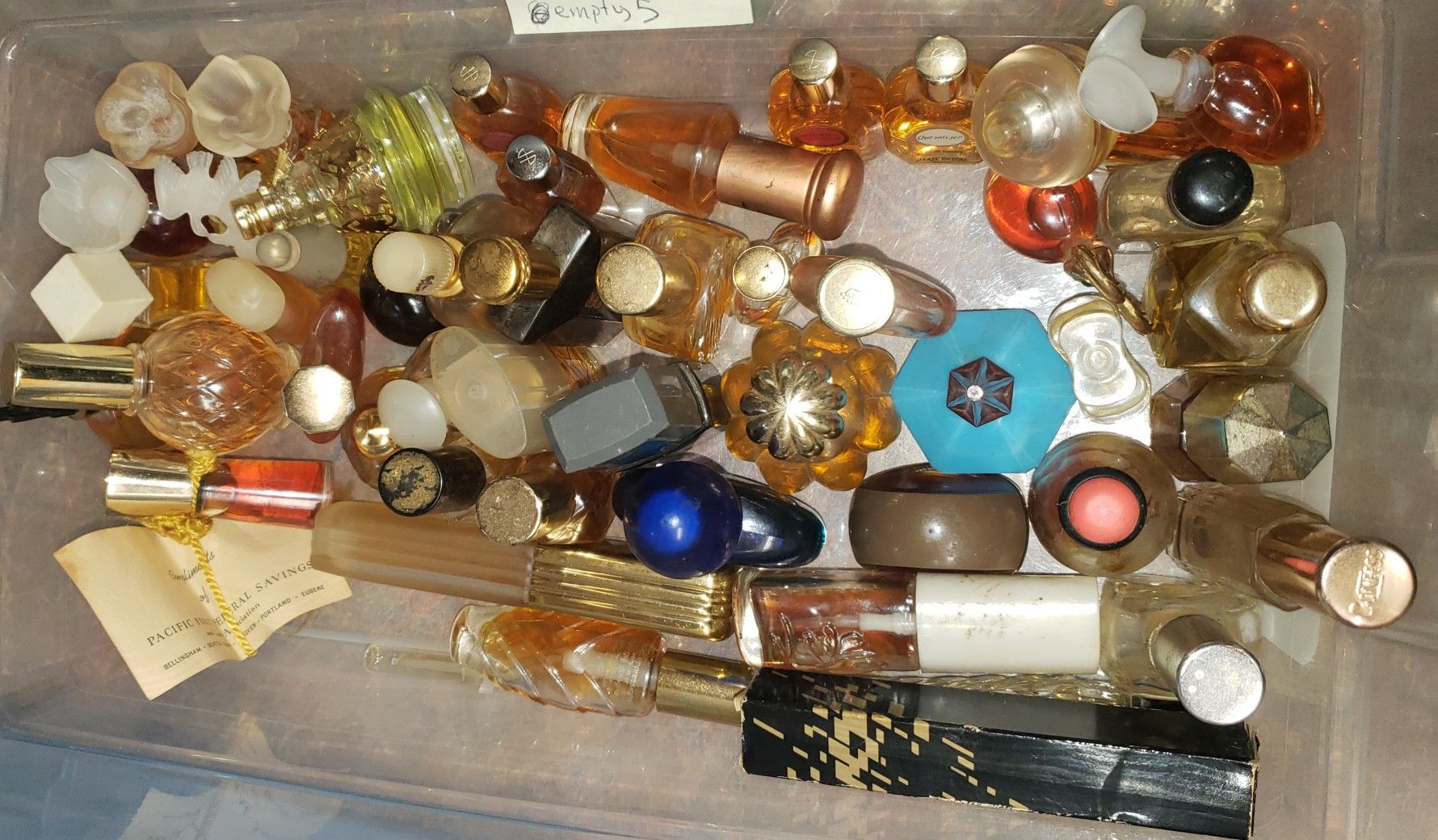 Over 60 vintage mini perfume bottles only 5 are empty!