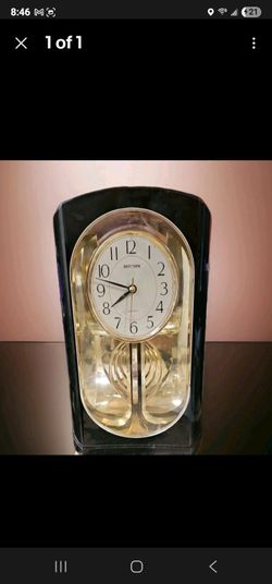 Rhythm Hypnotic Front to Back Pendulum Mirrored Quartz Clock  10" Black & Gold