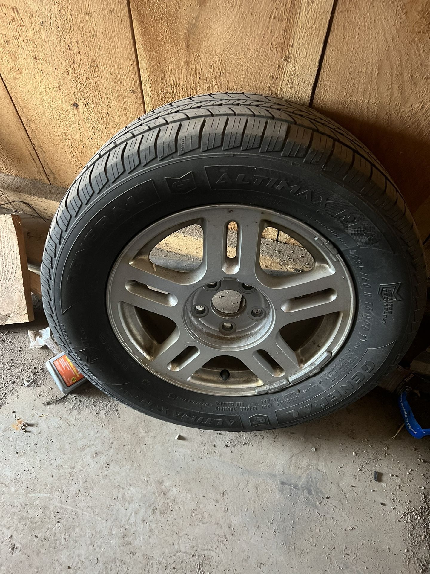 Four Aluminum Ford Rims With Center Caps