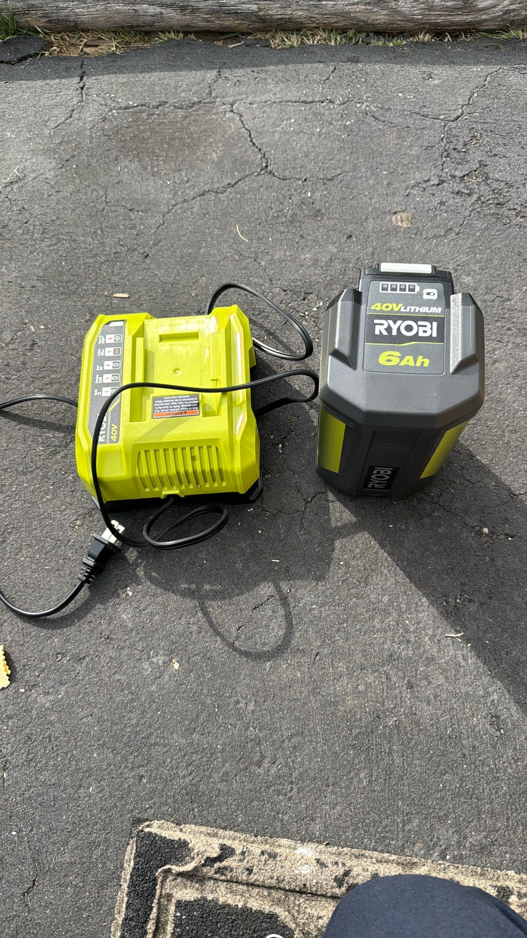 Six amp 40 V lithium Ryobi battery And Charger