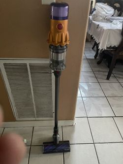 Dyson V12 Detect Slim™ vacuum Our lightest intelligent cordless vacuum​ 