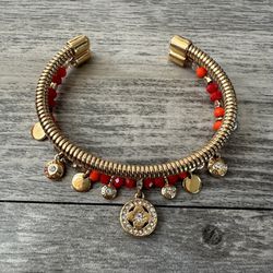 Henri Bendel red and gold beaded bangle bracelet