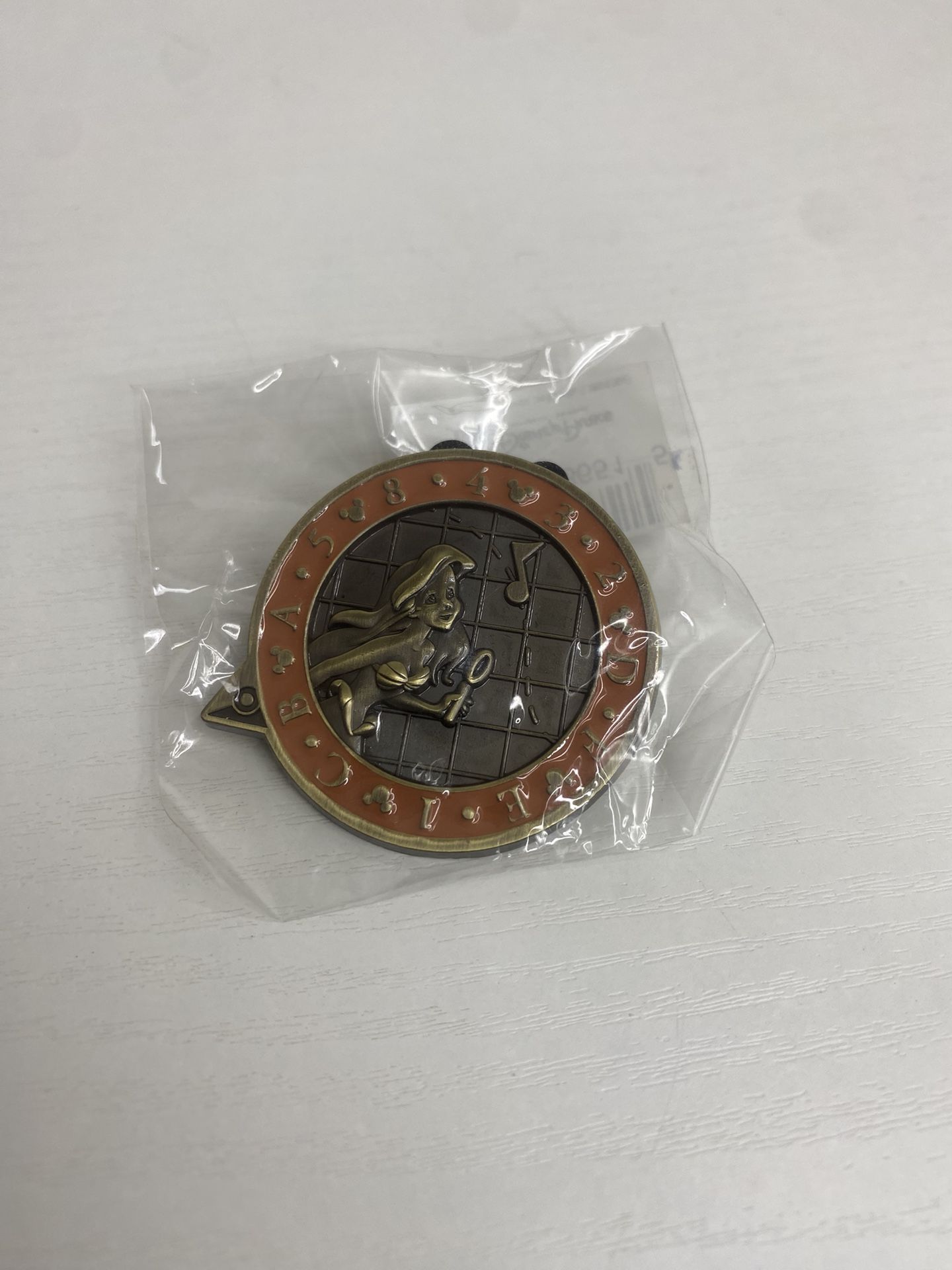 Disney Pin Quest Scavenger Hunt pin featuring Ariel from The Little Mermaid