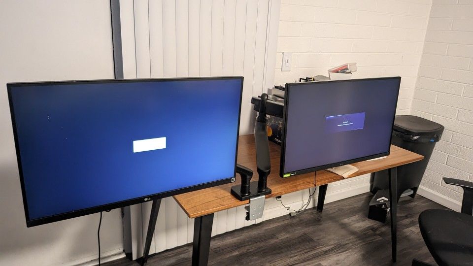 2 LG 27" Monitors With 2 Arm Stand