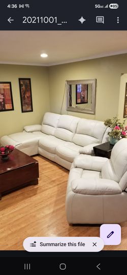 Cream 3 piece sectional with recliner