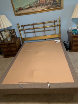 Queen Adjustable Bed Base with Remote and upholstered exterior. –