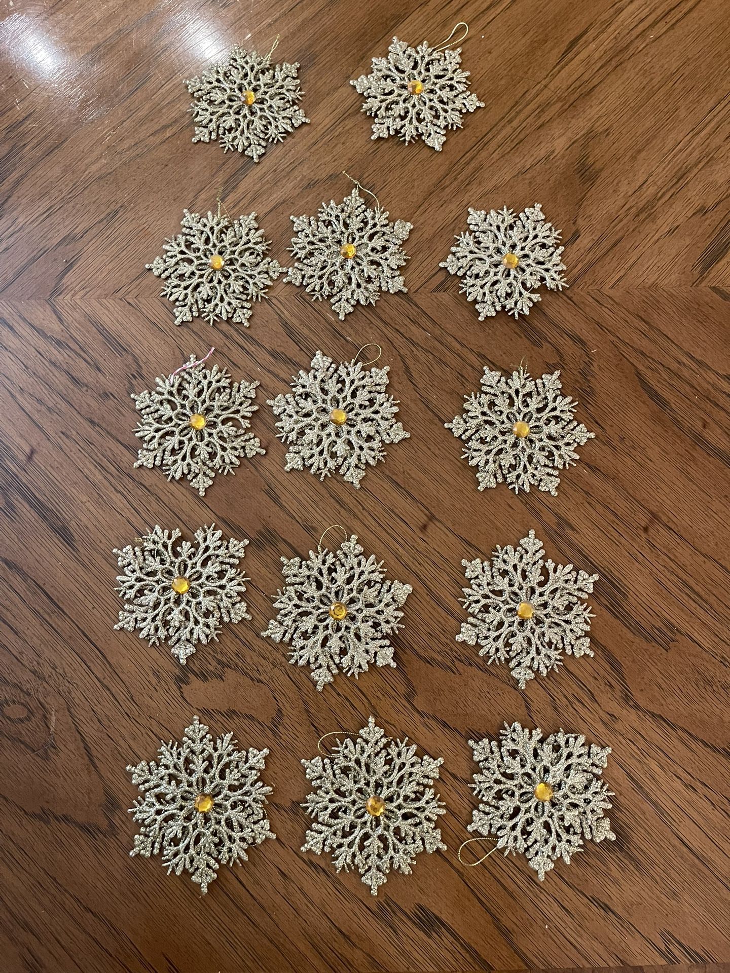 Lot of 14 Like New Gold Glittery Snowflake Ornaments with a Faux Orange Jewel in the Center of Each One