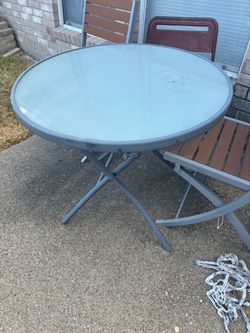 Outside table and 2 chairs