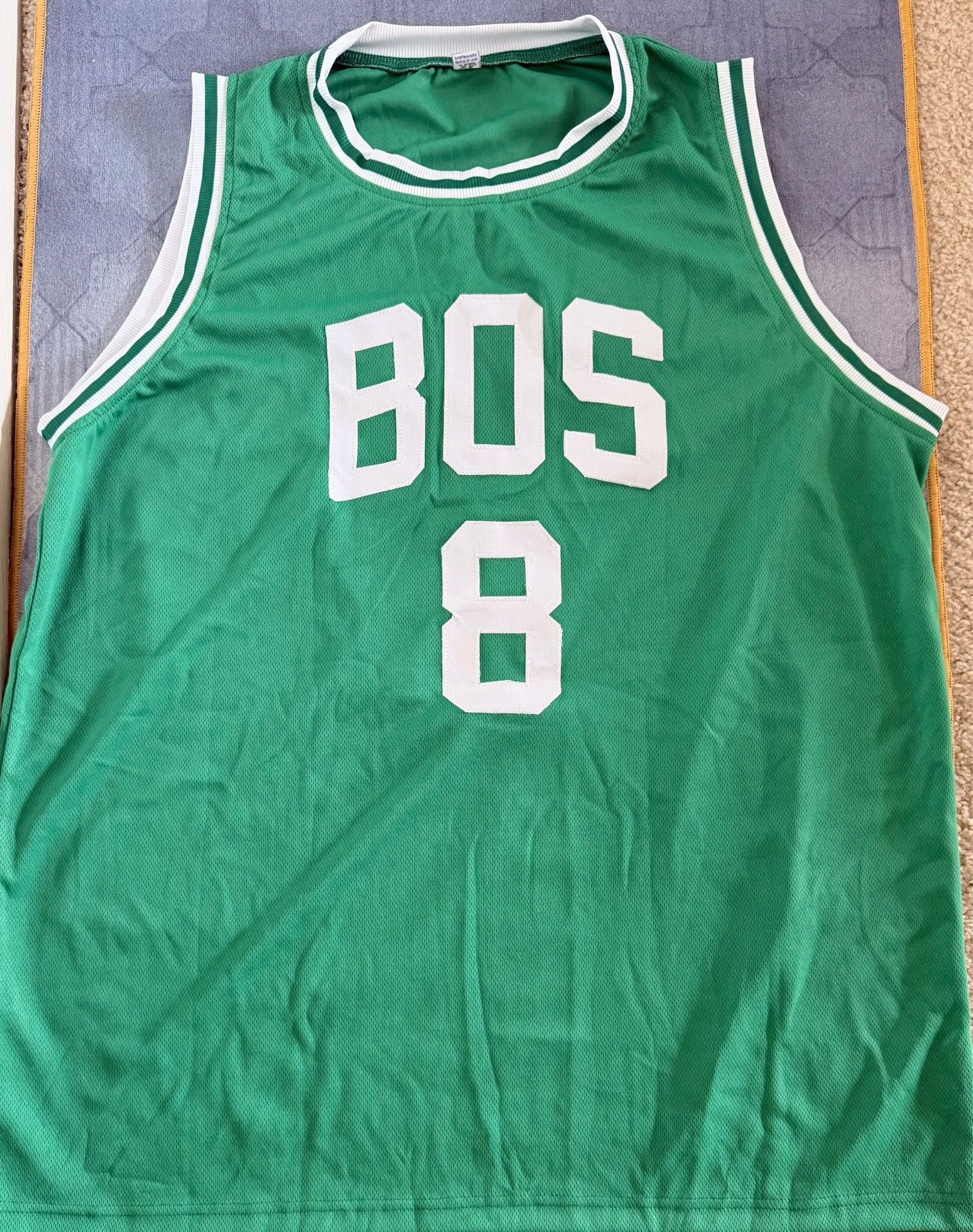 Kristaps Porziņģis AUTOGRAPHED Celtics Jersey (JSA Authenticated)