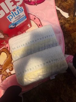 One bag of pamper diapers size 1