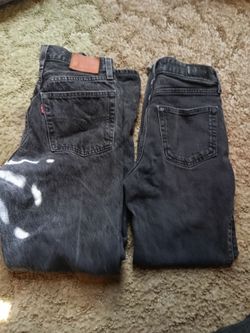 Black Levi's and Hollister pants