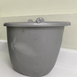 10-quart plastic bucket with spout, without handle.