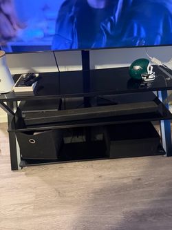 black and silver tv stand