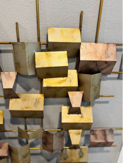 Metal wall piece