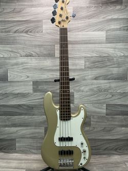 The Squier Precision Bass 5-String Gold Electric Bass Guitar (A1D024175)