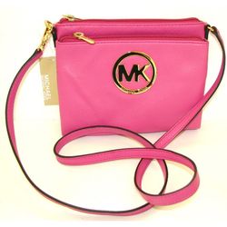Stylish Michael Kors crossbody bag in bright pink. Features dual zip compartments, gold-tone MK logo, and an adjustable strap. Perfect for daily essen