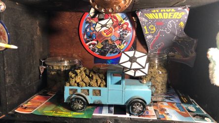 Toy car with a lot of green in it