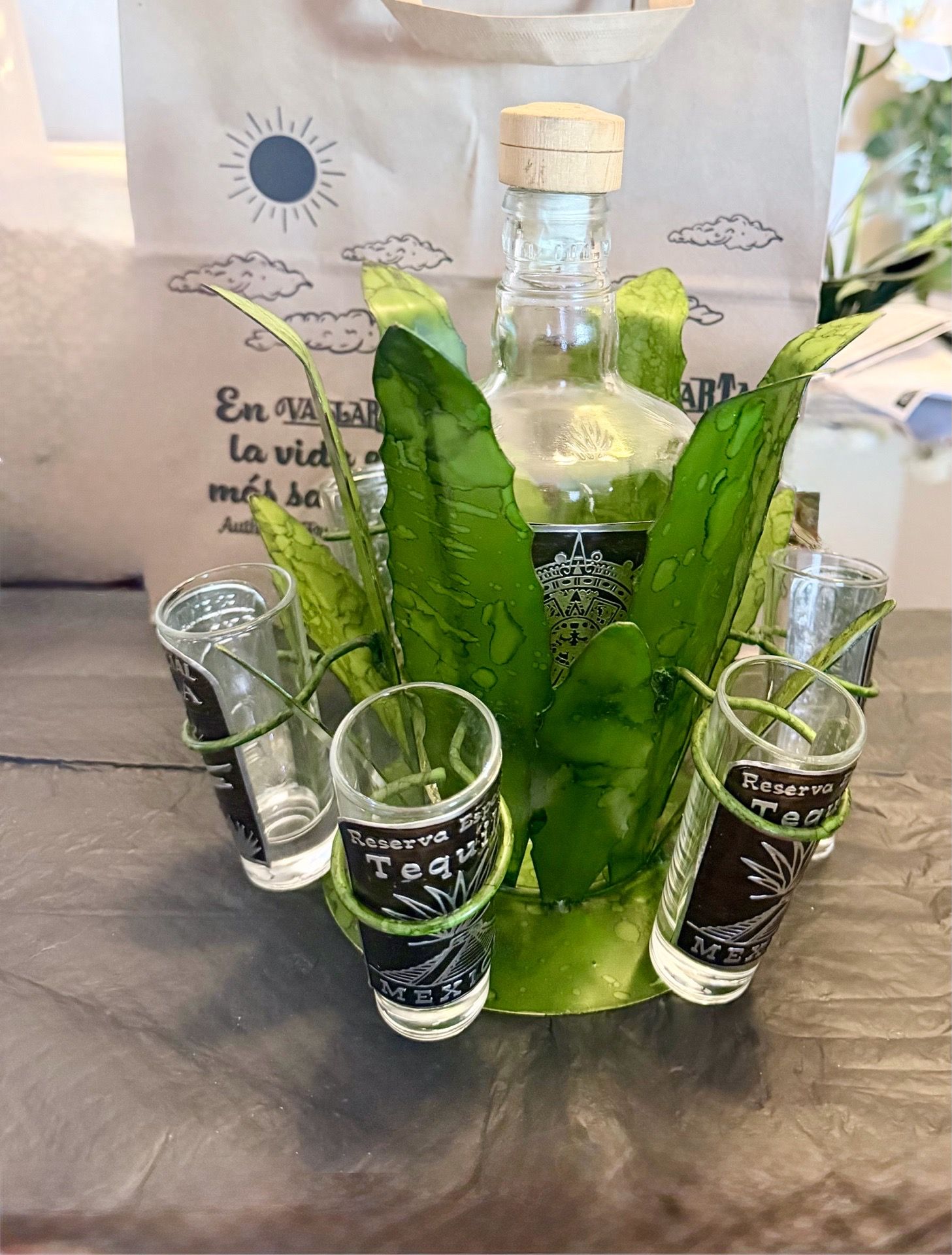 handcrafted Mexican agave-themed tequila set featuring a metal agave plant holder, bottle, and shot glasses.