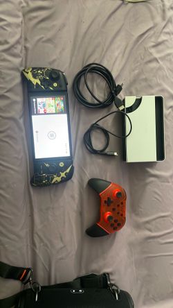 Nintendo switch oled speak joy cons and 20 games