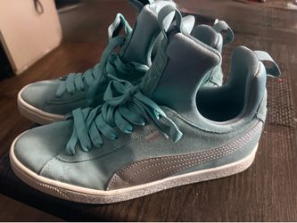 Puma Suede Fierce women's sneakers in teal with silver accents.