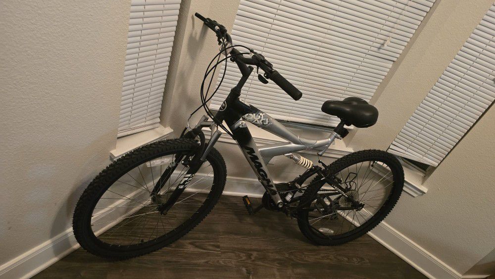 Bicycle 21in, new tires,  new seats, new brakes,  new transmission controller,  and new handset