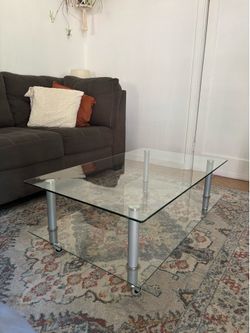 Glass table on wheels