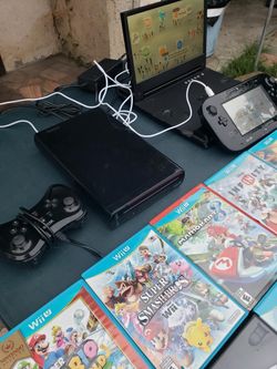 Nintendo Wii U Console With Cables. Gamepad. 11 Great Mario & other Great Games. $350! Or $500! With Monitor. Trade are welcome
