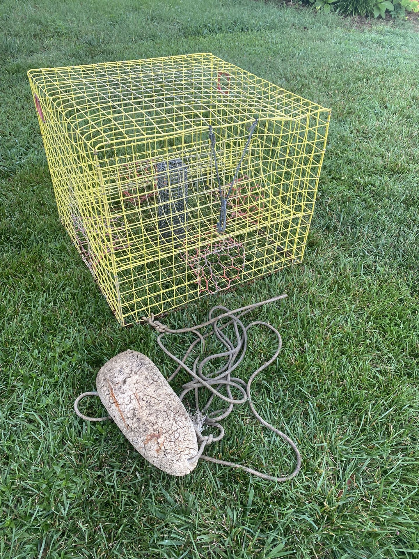 Commercial crab trap with rebar weight, line, buoy