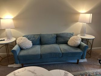 Sofa in light teal color in great condition in a pet free and smoke free house