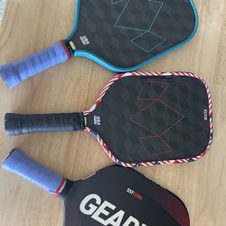 Pickle ball paddles.