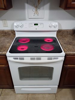 GE, White Electric Stove.