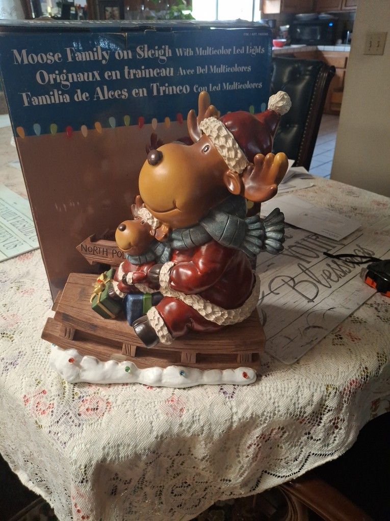 Moose family On sleigh 14x12 In. Lights Up But I Never Tried It