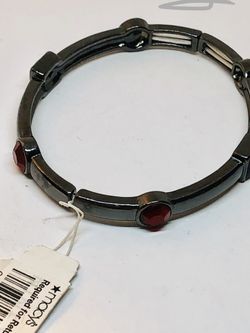 NWT Macy’s metal bracelet in dark brown and dark red acrylic accent