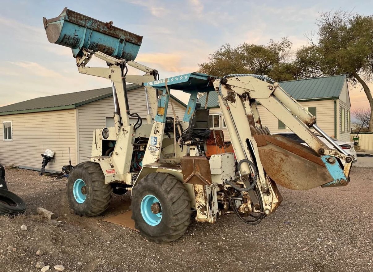 Diesel Tractor/backhoe π