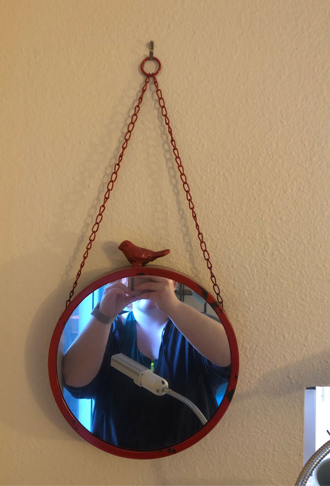 Red hanging mirror
