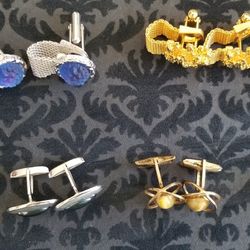 8 Sets Of Cufflinks. 