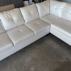 Brand New Off White 2 Piece Faux Leather Sectional with defects