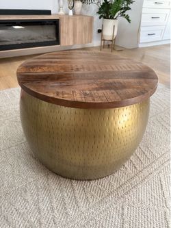 Drum coffee table with storage