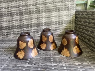 Westinghouse set of three bell shaped glass lampshades