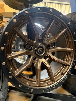 On sale: new: FUEL REBEL 20x10 bronze or black wheels & 33x12.50-20 tires For: TRUCK & SUV 5 6 8 lug (We Finance)