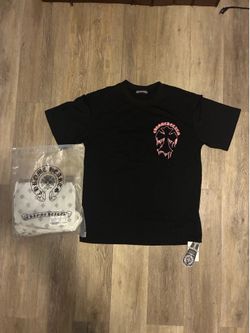 black t-shirt with pink dripping cross graphic