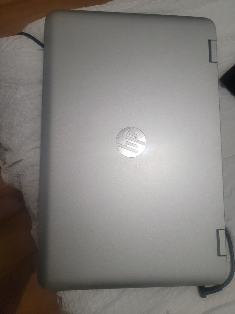 HP Envy X360, Silver 15.6in with 8gb Memory, 1.7GHz 4th generation Intel Core i5
