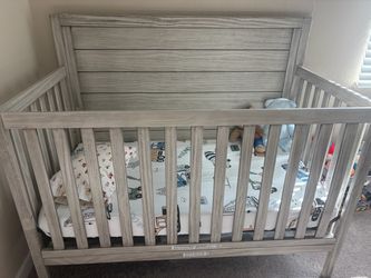 Delta Children 4-in-1 Convertible Crib + Mattress & Bedding Set