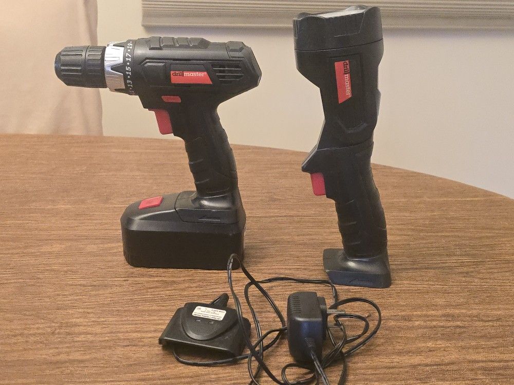 Set of two black cordless power tools.