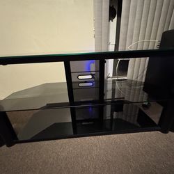 Smoke glass tv stand 70” heavy weight.