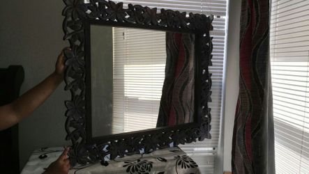 wooden flower framed mirror