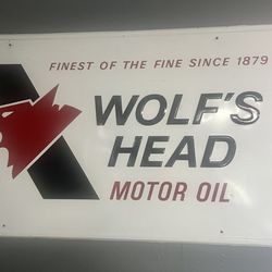 Embossed NOS Wolf ‘s Head Gas Oil Advertising Sign
