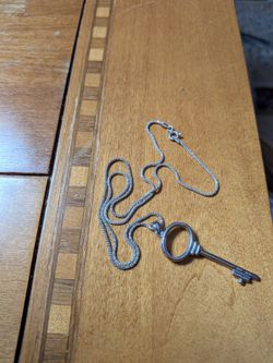 .925 Sterling Silver Key to your Pendant.