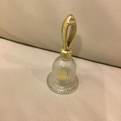 Pretty Little Glass Bottle Shaped Like A Bell. The Cap Is A Plastic Gold Colored The Bell Handle . 